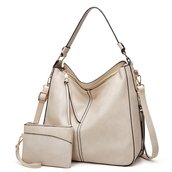 Women's chic leather tote, shoulder bag style, perfect for everyday elegance.