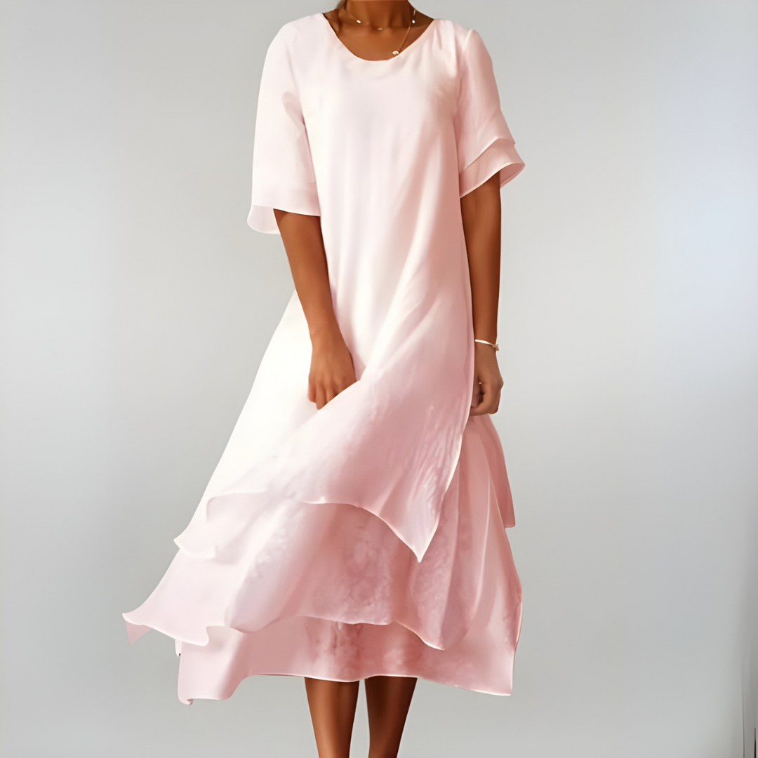 Elegant women's lightweight maxi dress for summer. Flowing silhouette perfect for casual chic or vacation wear.