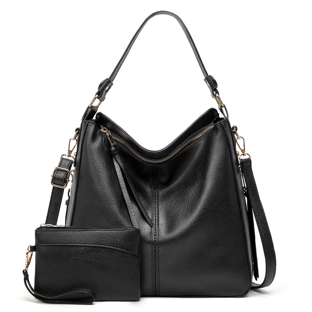 Elegant women's versatile leather shoulder bag in a classic brown.