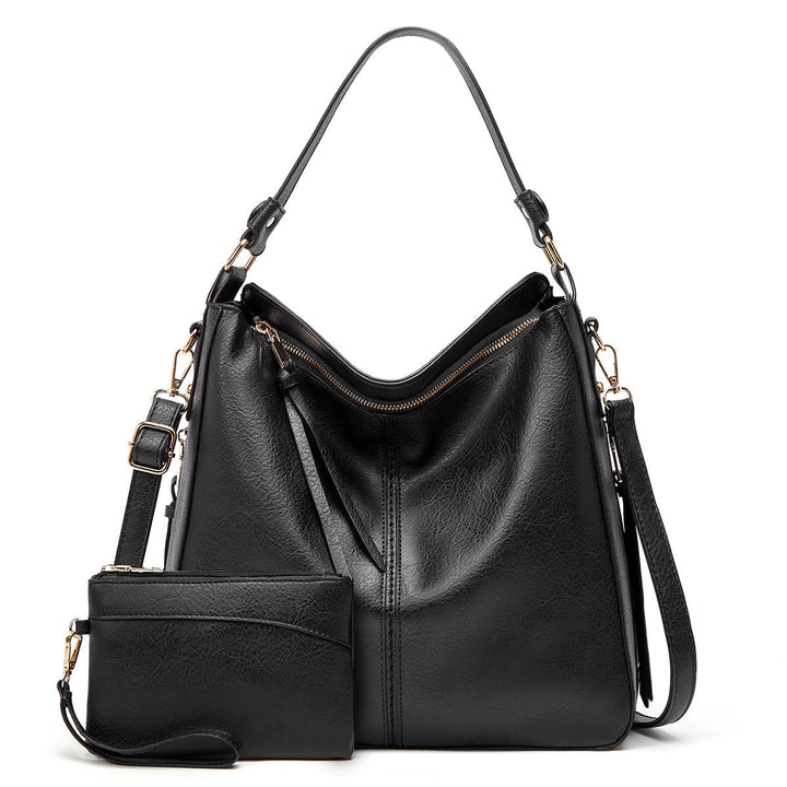 Elegant women's versatile leather shoulder bag in a classic brown.