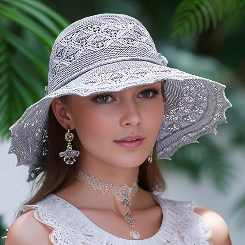 Women's fashionable wide-brim sun hat, perfect for travel & beach. Offers stylish UV protection for summer vacations.