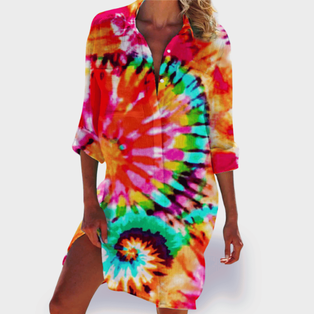 Colorful flowing women's summer midi dress, lightweight & flattering for casual or vacation wear.