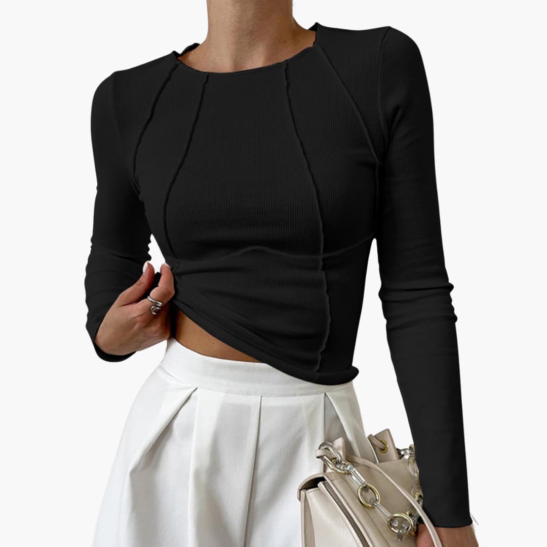 Stylish women's sculpted fit long sleeve top with a seamless look. Perfect for versatile fashion.