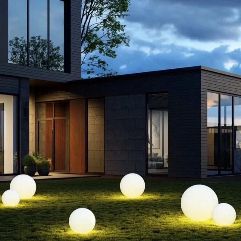 Outdoor spherical LED light, 16-color RGB, weatherproof, remote control for garden & patio ambiance.