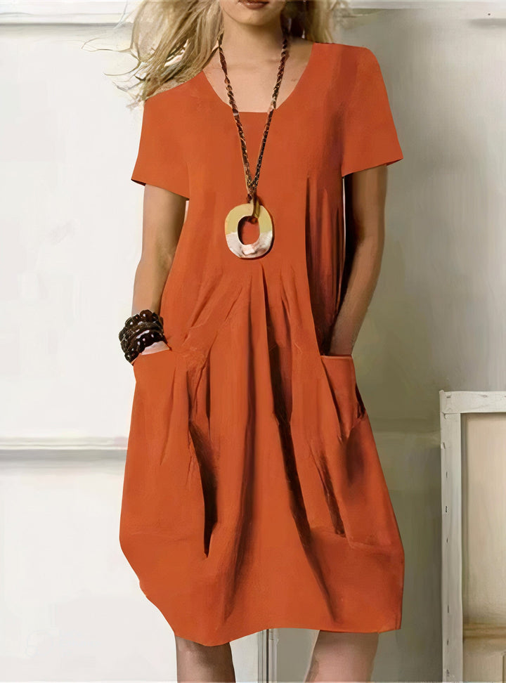 Comfortable green women's casual dress. Relaxed, flattering fit perfect for chic summer style and versatile everyday wear.