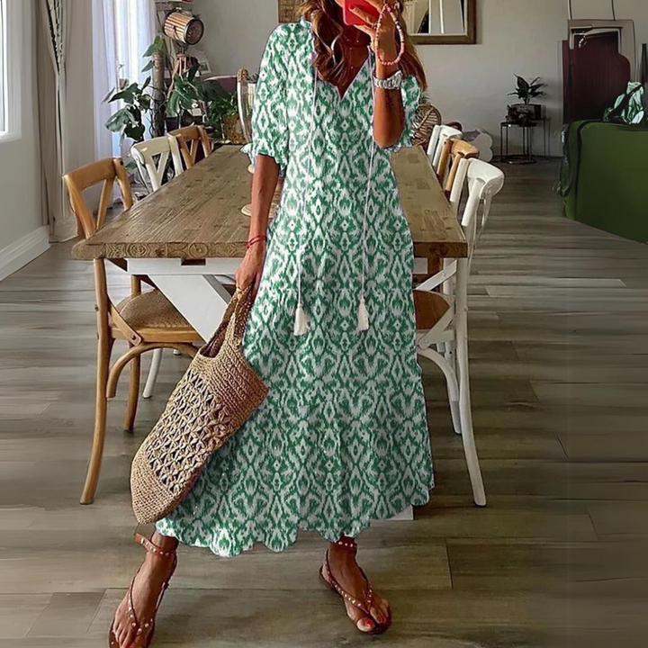 Flowing floral print maxi dress, a stylish V-neck summer dress for women's fashion & vacation outfits.