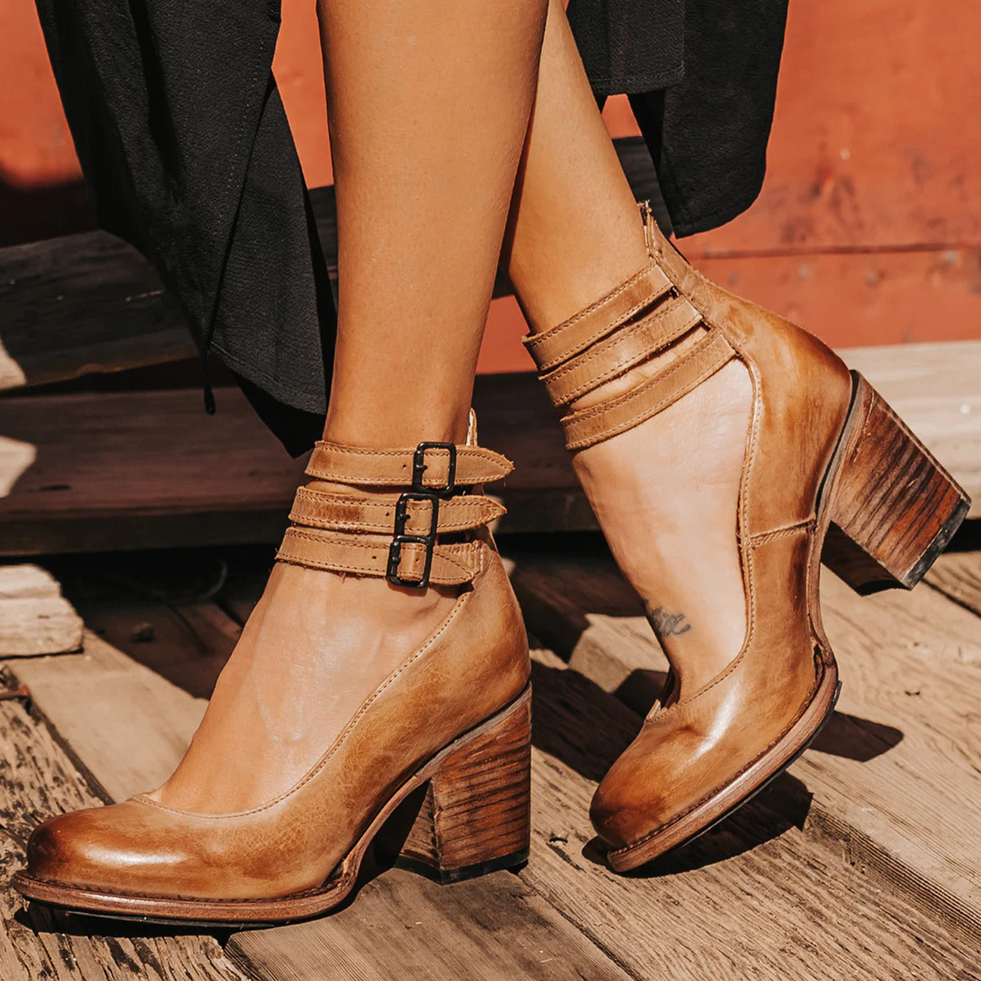 Women's orthopedic strappy ankle boots with block heel for comfortable everyday wear and style.
