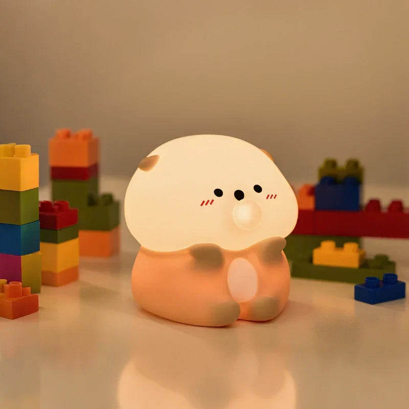Dimmable kids' animal night light; soft silicone LED lamp, portable and great for sleep.