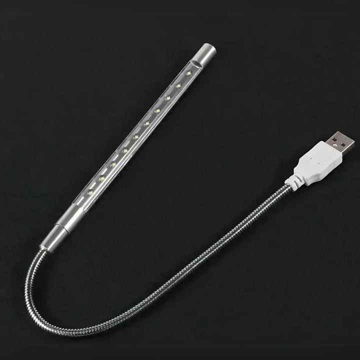 USB-powered LED desk lamp, flexible gooseneck design, dimmable for precise keyboard lighting.