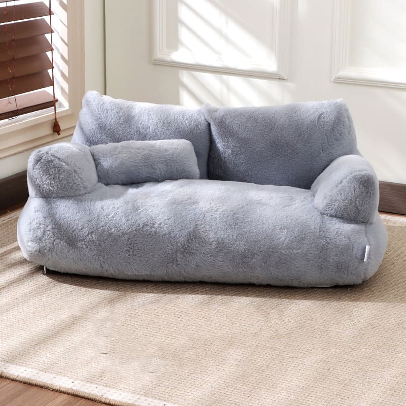 Luxurious calming dog bed with bolstered sides, providing a secure, anxiety-relief haven. Soft, washable pet sofa.