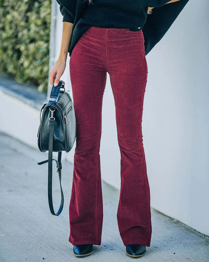 Flattering high-waist flare trousers for women, showcasing retro chic style & comfortable fit.