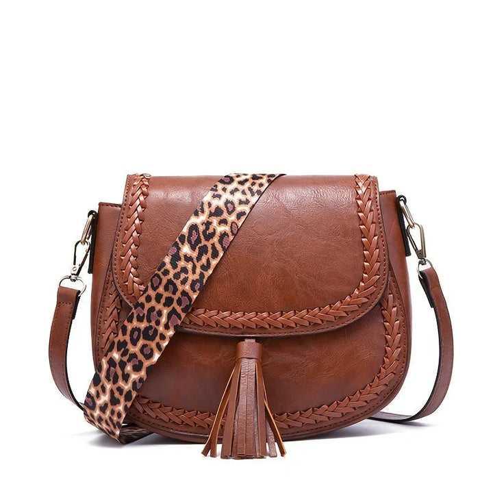 Everyday chic: women's faux leather shoulder bag with a stylish tassel, perfect for essentials.