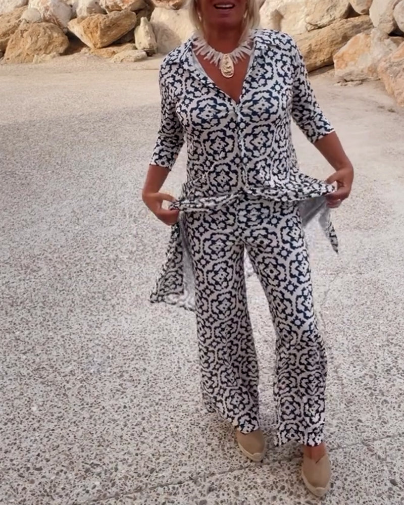 Printed V-neck tunic and matching wide-leg pants. Women's comfortable & stylish two-piece set.