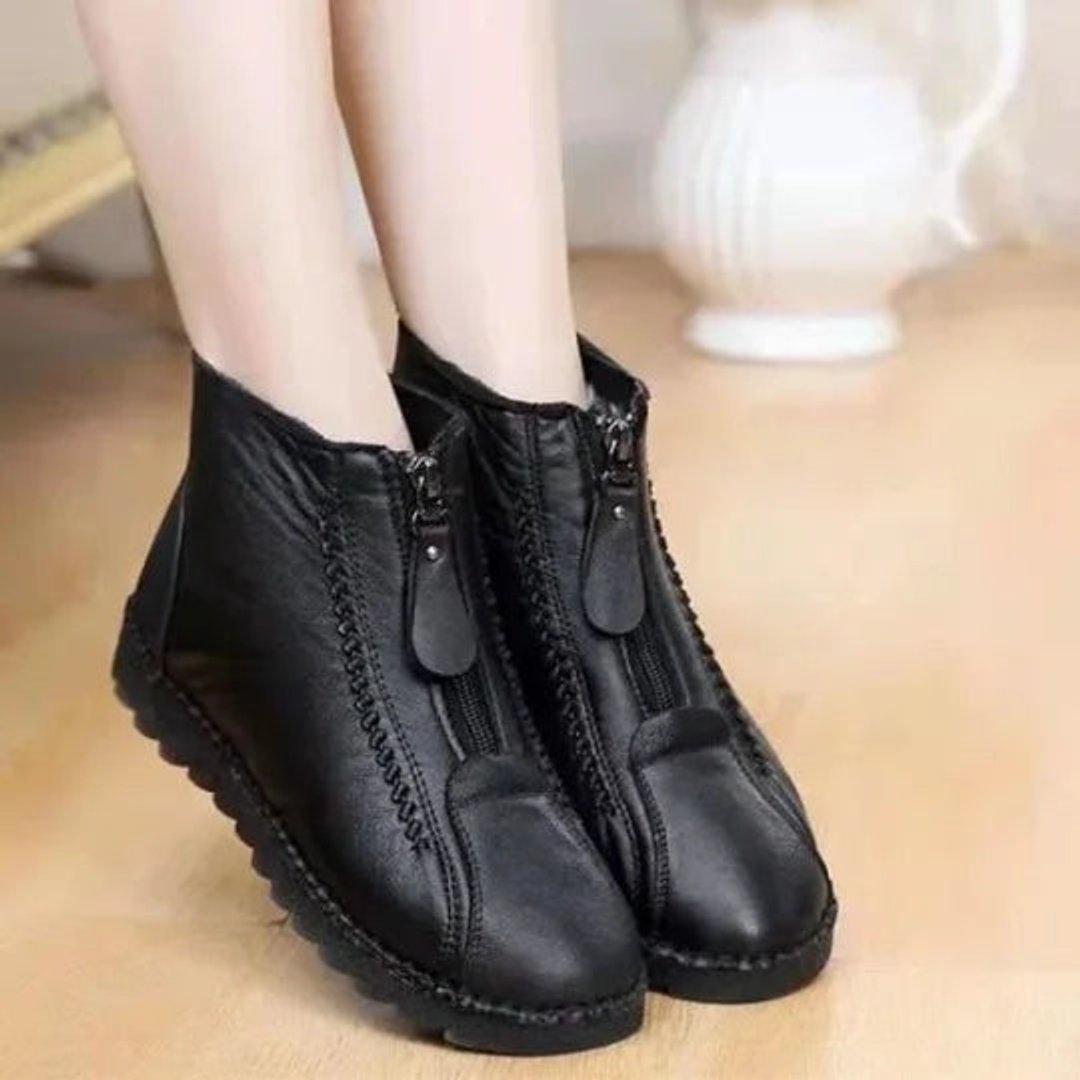 Women's warm ankle boots designed for everyday comfort in winter. Slip-resistant soles provide secure footing.