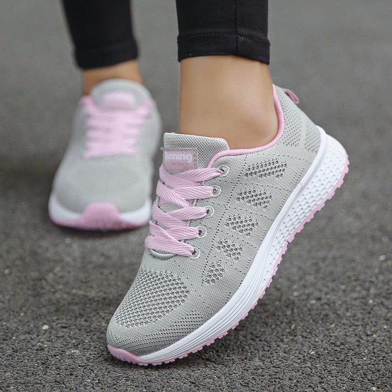 Close-up of women's orthopedic sneaker sole, highlighting non-slip design, cushioning, and arch support.
