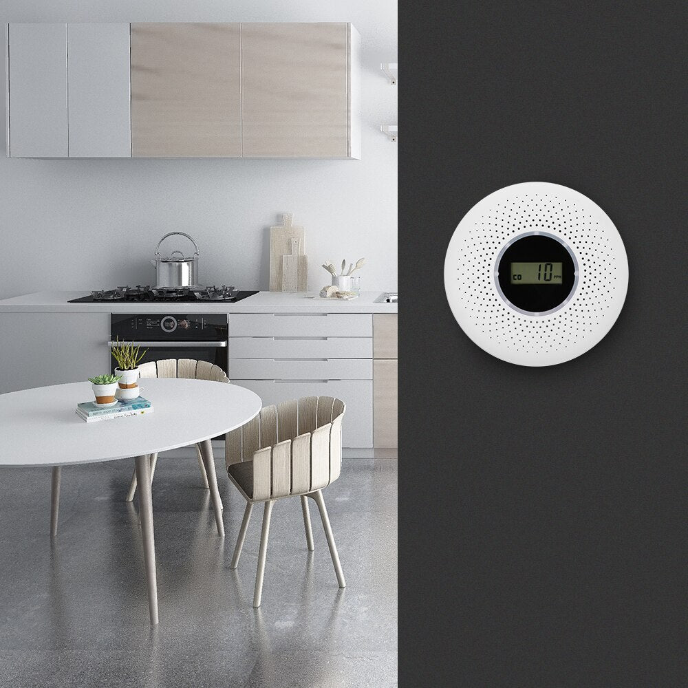 Detail of a white carbon monoxide & smoke alarm, a vital home safety device for fire and CO detection.