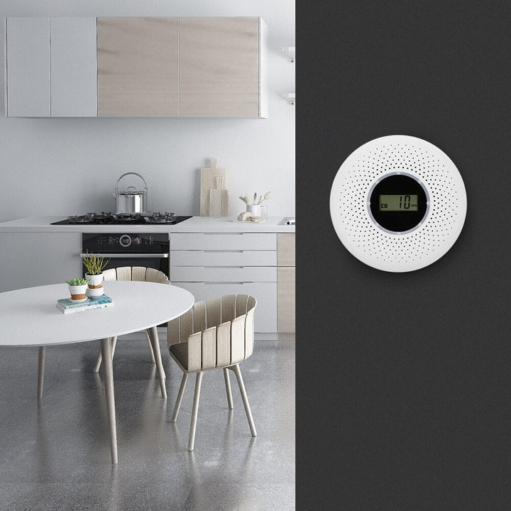 Detail of a white carbon monoxide & smoke alarm, a vital home safety device for fire and CO detection.