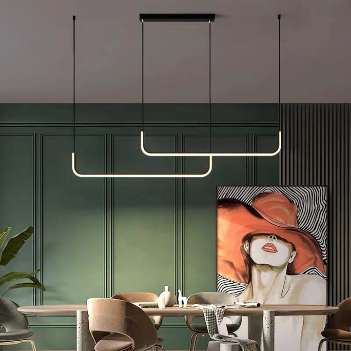 Contemporary black and gold Arisha LED pendant light, ideal for living room decor.