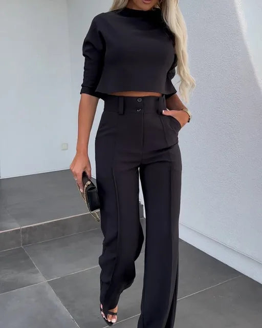 Chic women's autumn matching set, versatile two-piece outfit. Cropped top, tailored pants. Elegant fall fashion.