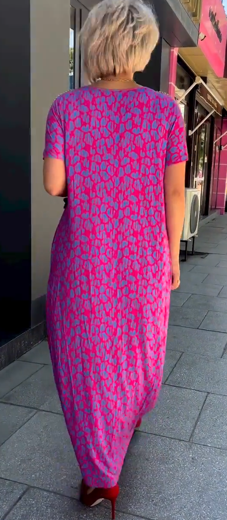 Women's elegant rose red floral V-neck A-line summer dress. Sleeveless, perfect for a chic party or relaxed casual look.