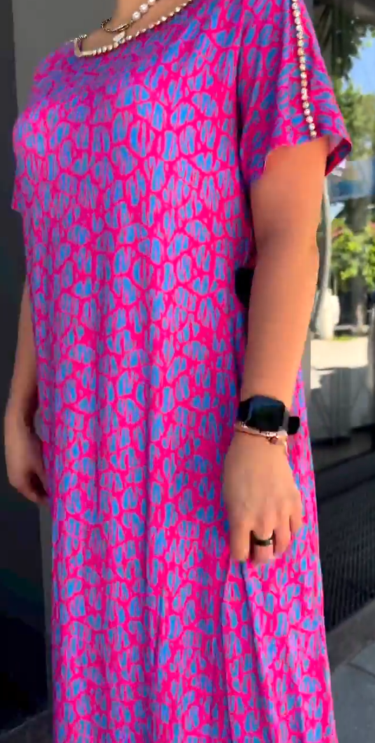 Beautiful rose red floral A-line party dress for women. Elegant sleeveless V-neck design, perfect for summer fashion.
