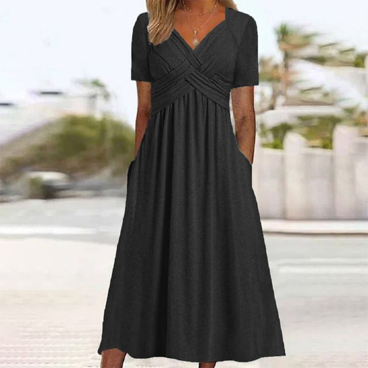 Elegant women's Luxe V-Neck Silhouette Dress, perfect for versatile wear from casual to work.