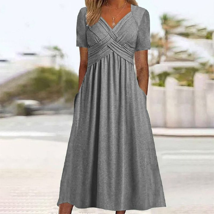 Fashionable Women's Luxe V-Neck Silhouette Dress, an elegant and versatile piece for any occasion.