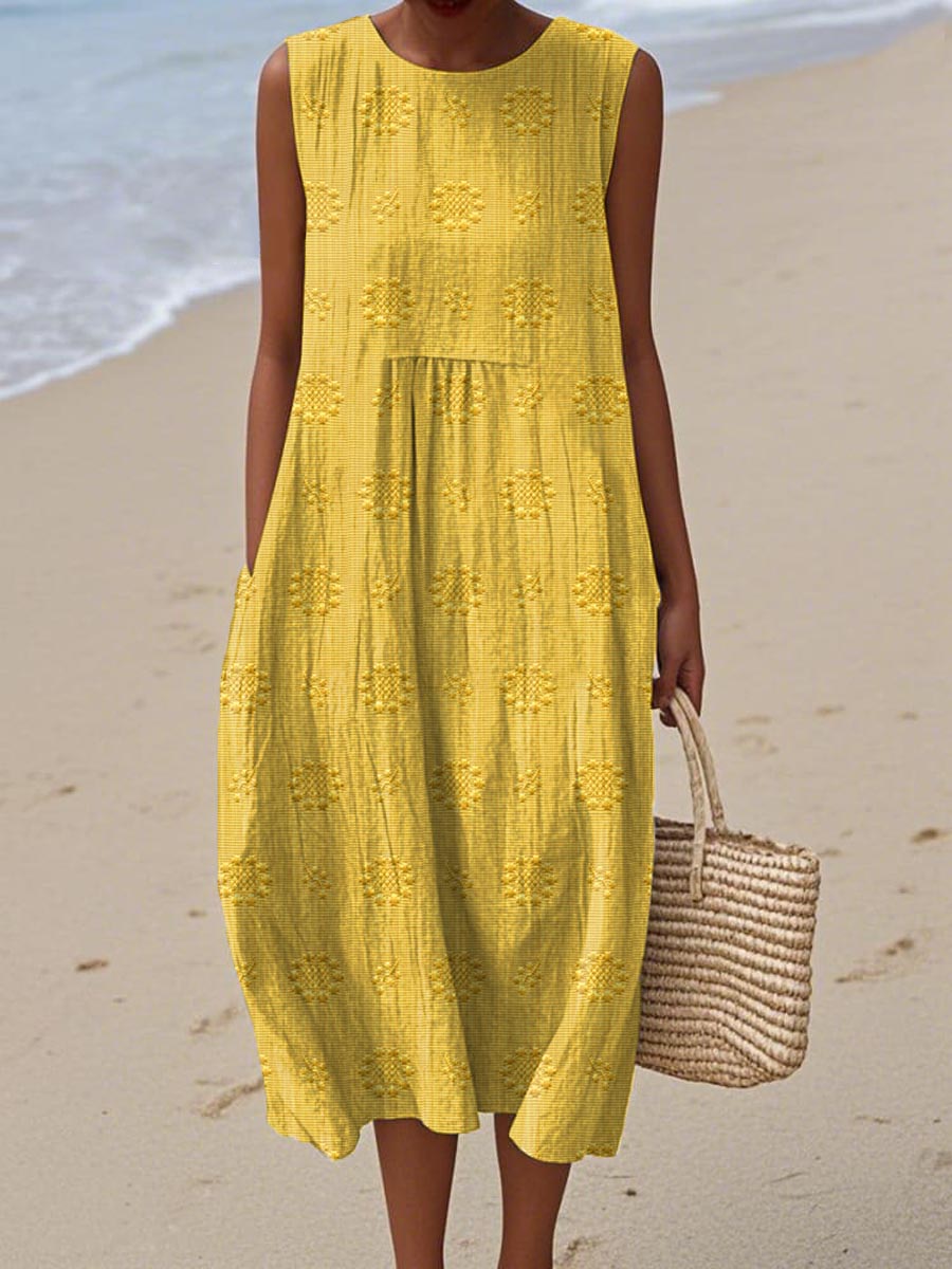 Close-up of elegant embroidery on a women's summer midi dress, showcasing unique detailing and spring style.