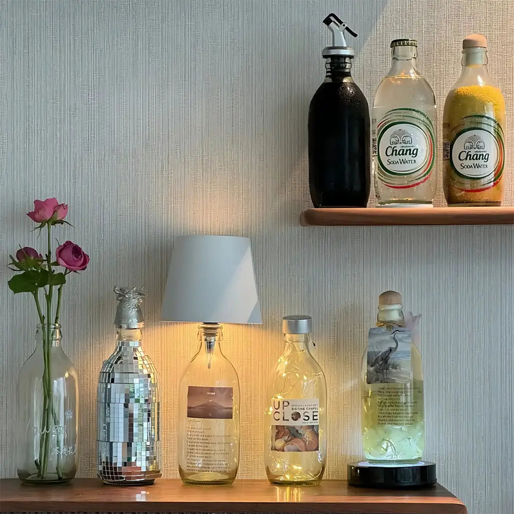 Versatile Nvroome LED bottle light, rechargeable cap turns bottles into stylish, portable lamps.