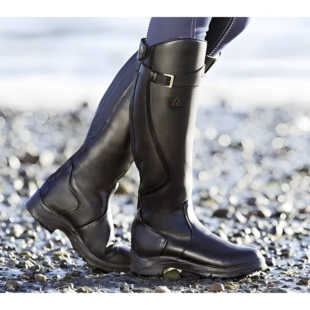 Versatile women's waterproof knee-high boots with buckle, perfect for all-weather equestrian style.