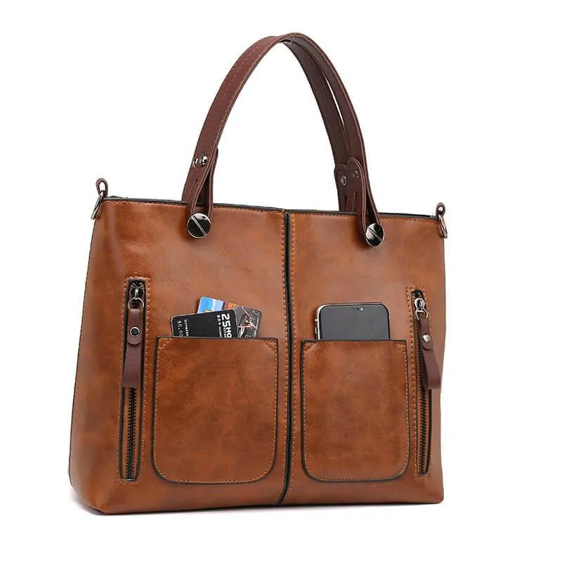 Stylish women's leather handbag with a sleek design, perfect elegant accessory for any modern outfit.