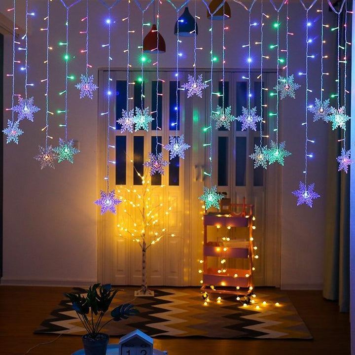Elegant LED snowflake fairy lights, perfect for Christmas & winter party ambiance.