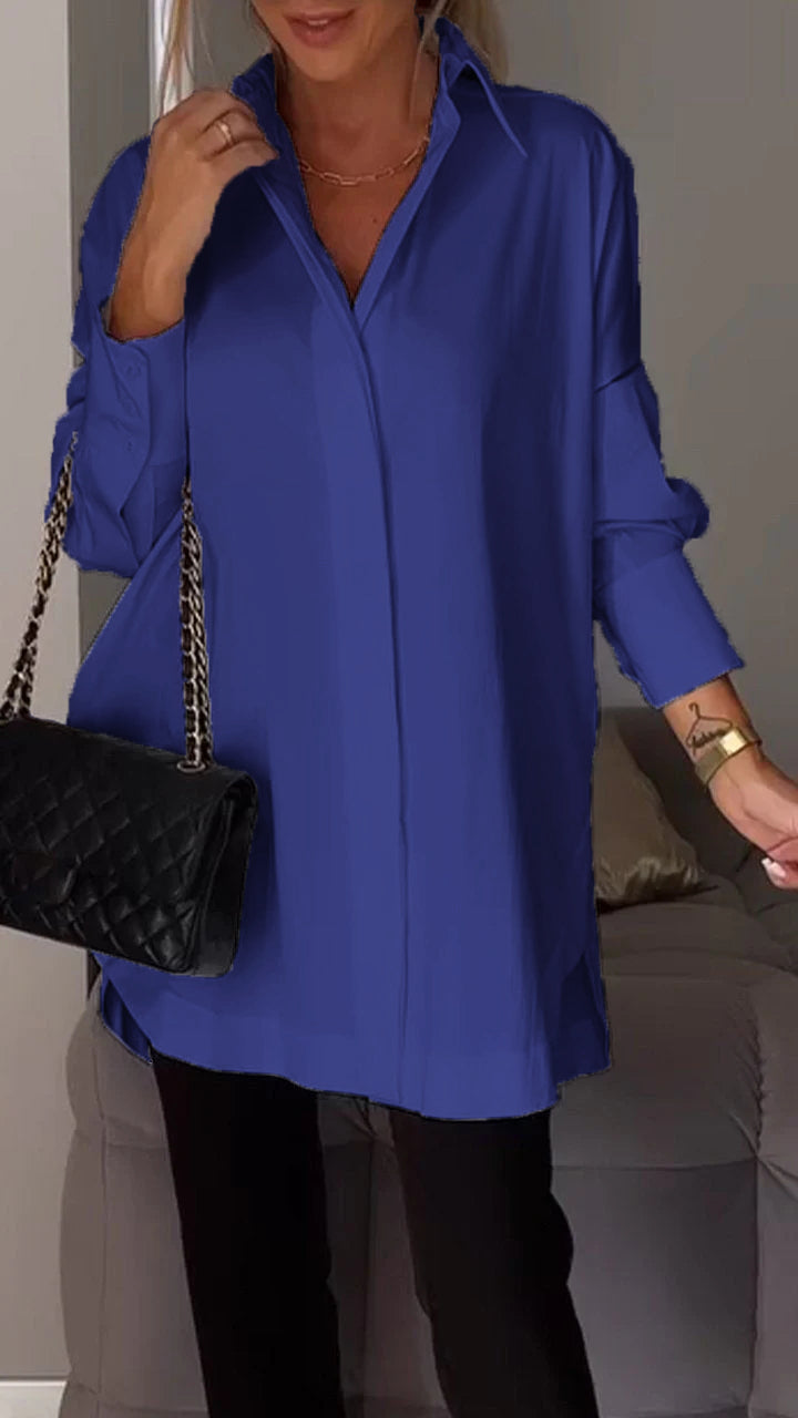 Detail of women's sophisticated long-sleeve lapel shirt, highlighting the elegant design.