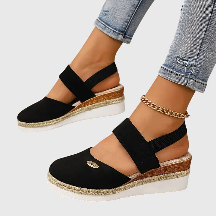 Versatile women's orthopedic support sandals with adjustable straps for all-day comfort & foot health.