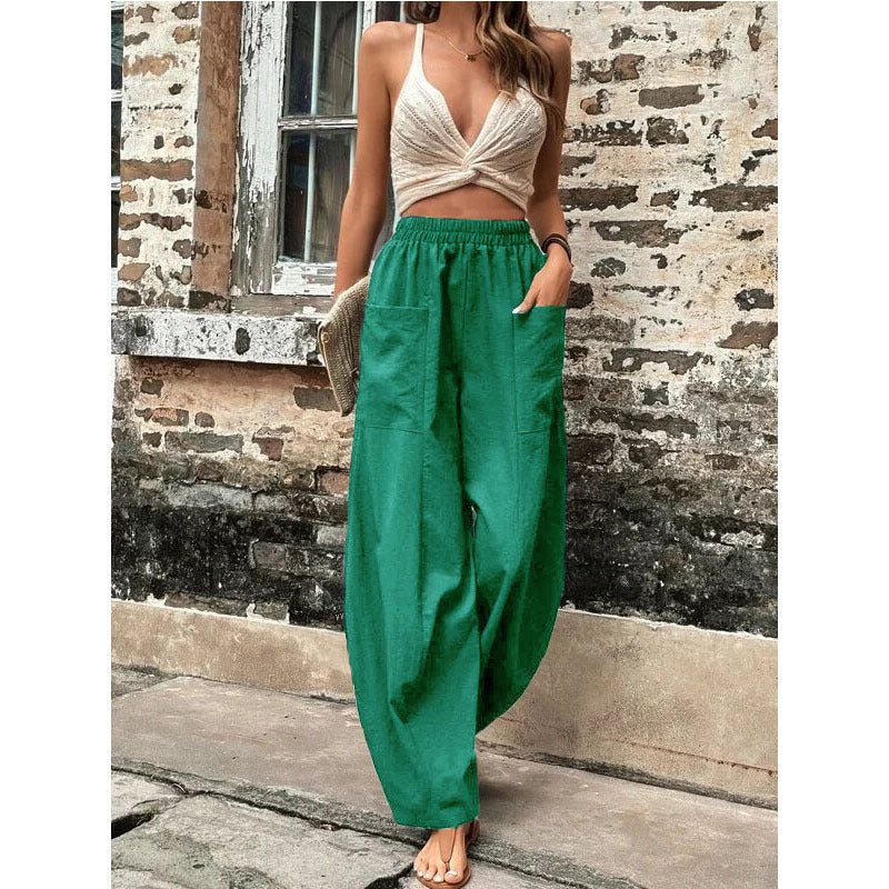 Side profile of versatile women's wide-leg pants with pockets, showcasing a comfortable, flowing silhouette.