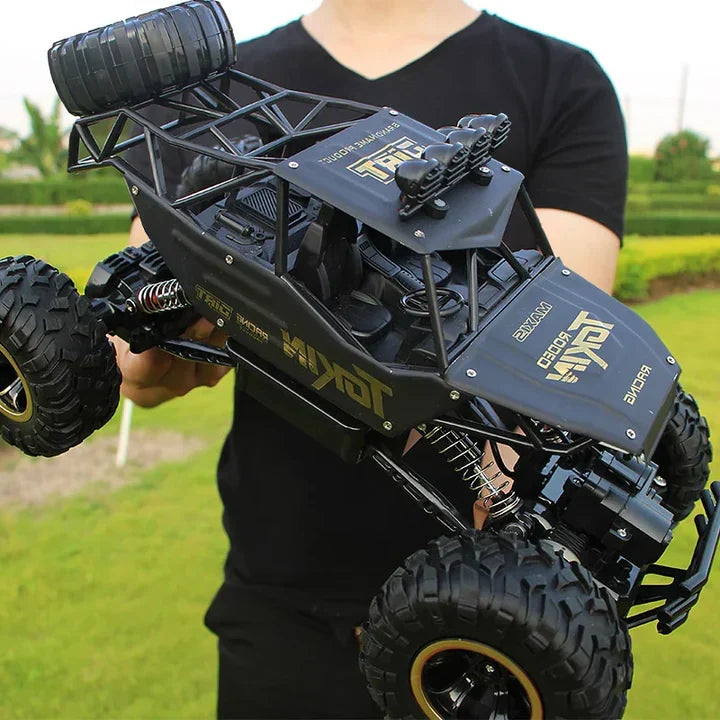 Unisex 1:12 scale RC monster truck, all-terrain 4WD, high-speed remote control toy for outdoor adventures.