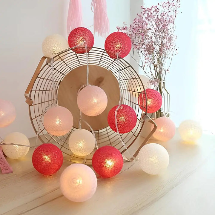 Modern cotton ball LED lights, sleek design for contemporary home and event decor.