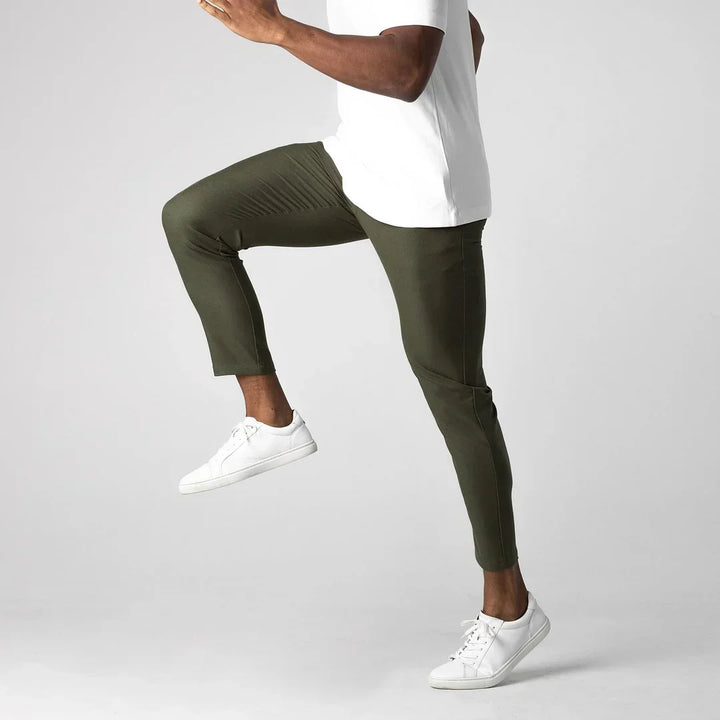 Tan versatile chino pants, bringing a touch of modern style to men's casual wear.