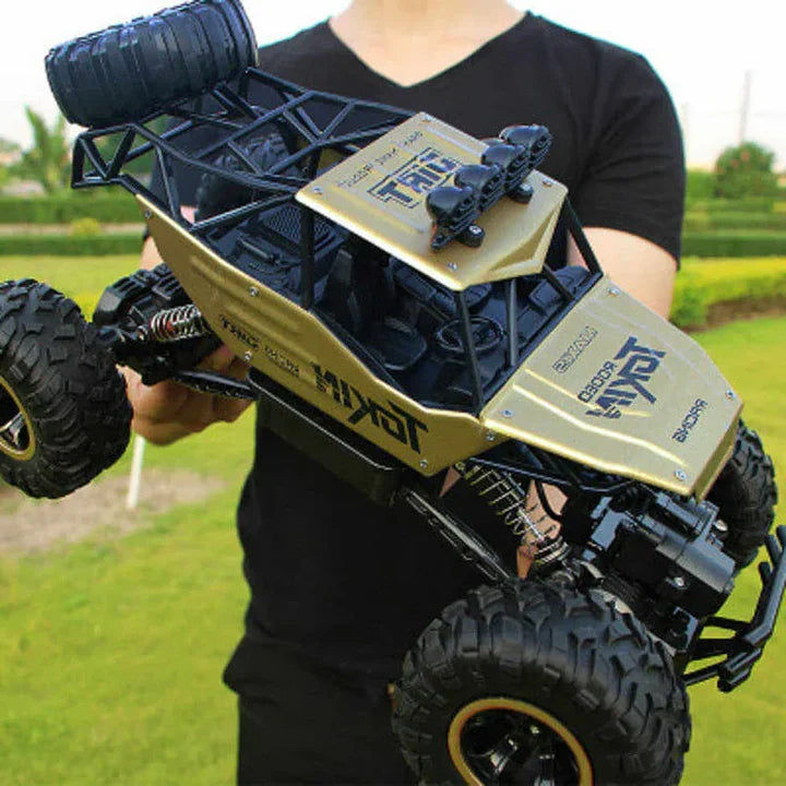 Durable 4WD RC monster truck tackling off-road terrain, high-speed remote control toy for kids outdoor fun.