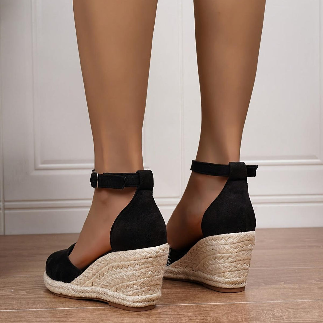 Everyday women's wedge sandals, perfect for casual summer wear. Features a comfortable design and adjustable ankle strap.