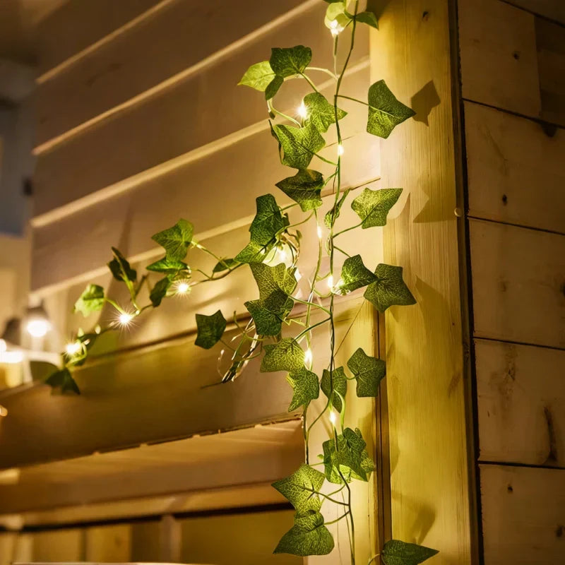 Decorative warm white LED leaf string lights, ideal for bedrooms, patios, or parties.