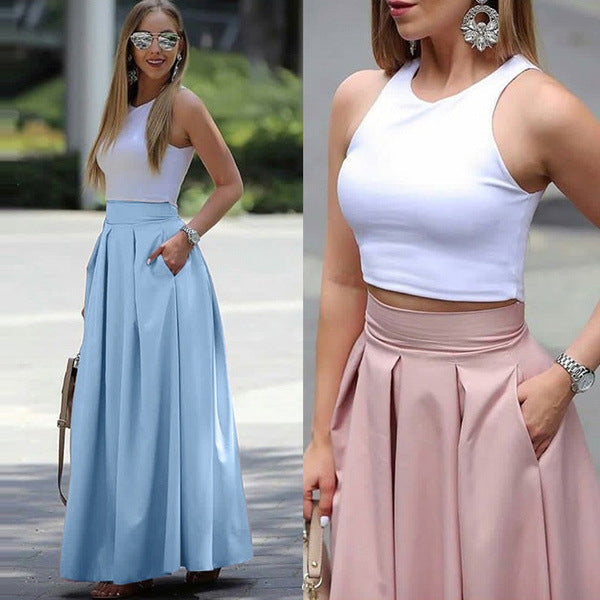 Close-up of a women's sophisticated pleated skirt, showcasing fine pleats and high-waist design.