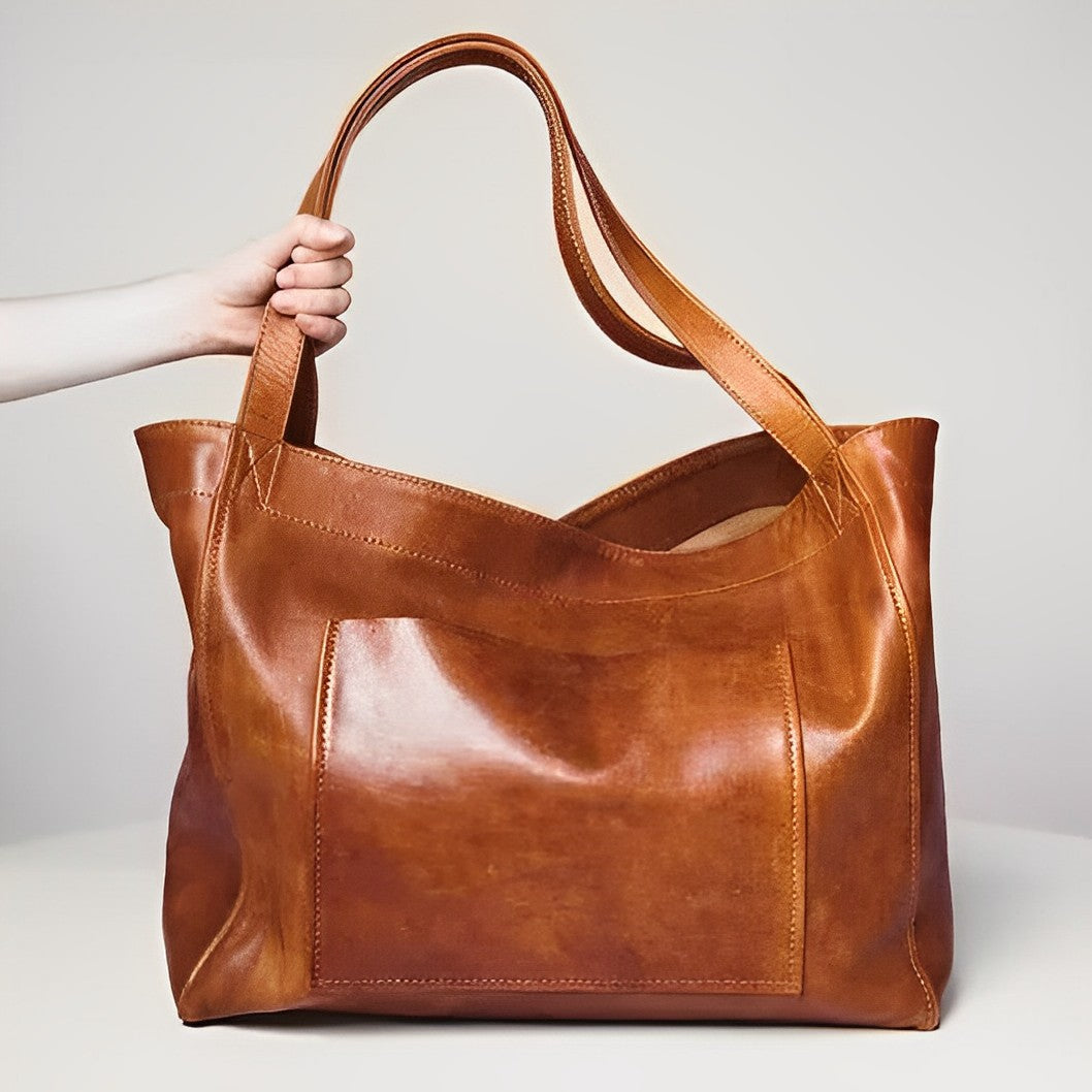 Women's vintage genuine leather crossbody shoulder bag in classic brown, perfect for everyday elegance.