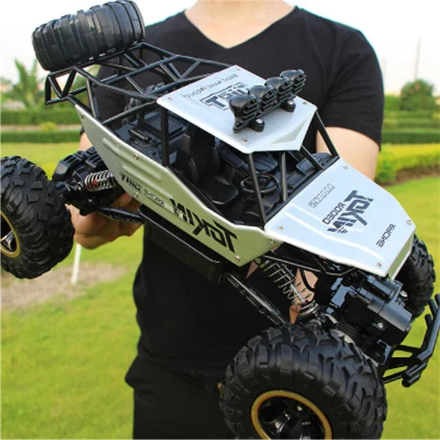 Exciting 1:12 scale RC monster truck, 4WD all-terrain remote control toy, perfect unisex gift for kids.