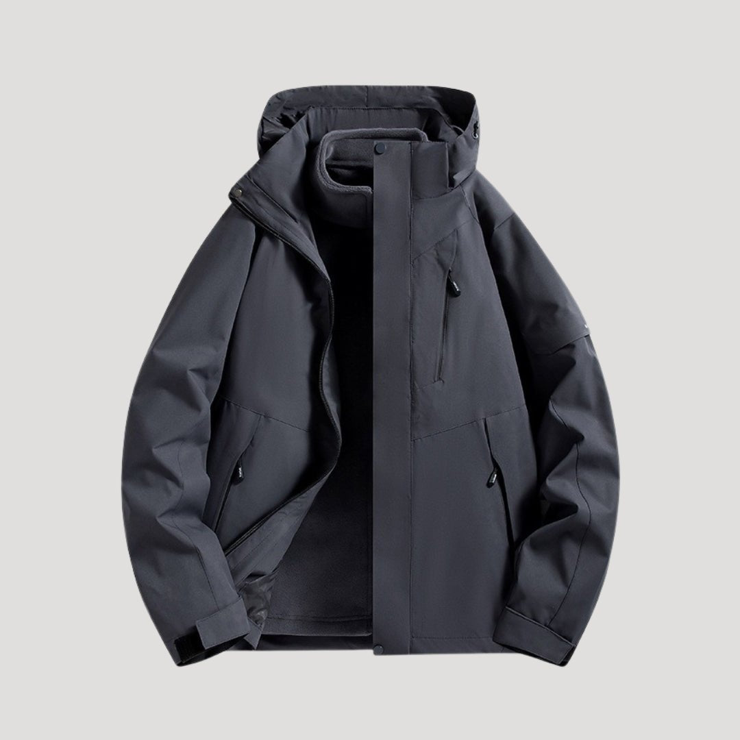 Unisex waterproof hooded jacket. All-season outdoor rain coat with versatile design for weather protection.