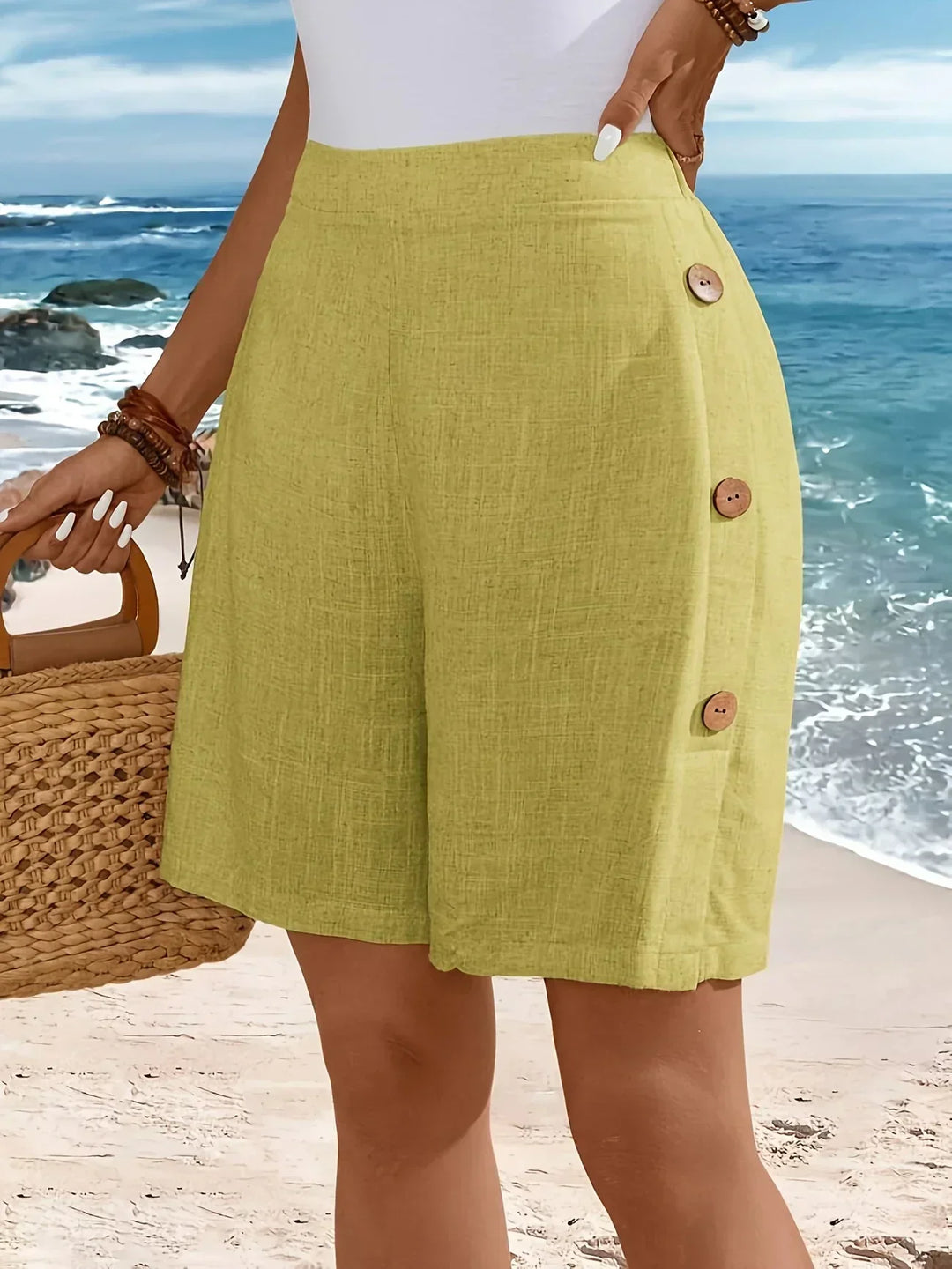 Woman showcasing high-waisted button-front comfort shorts, perfect for effortless summer style.