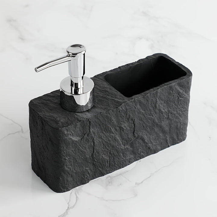 Stone-style soap dispenser with integrated sponge holder, perfect for kitchen sink organization.