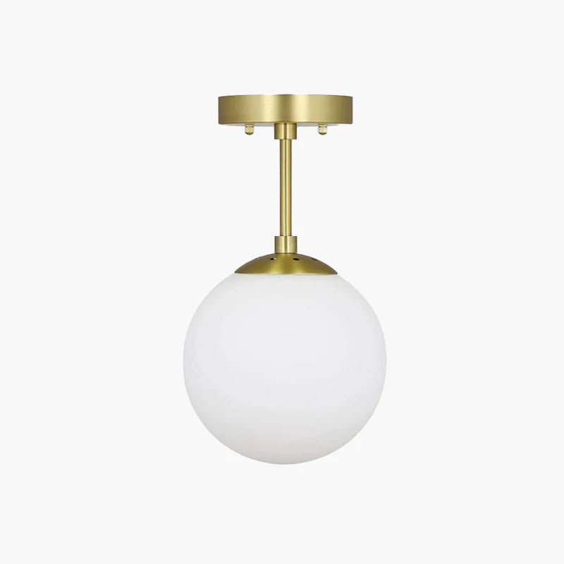 Modern LED globe flush mount ceiling light in gold finish for living room. Contemporary indoor lighting.