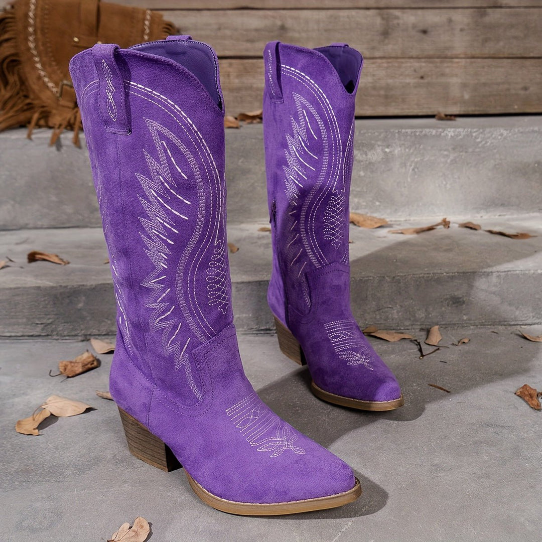 Chic women's tall cowboy boots with a distinct pointed toe design & intricate western embroidery for a stylish look.