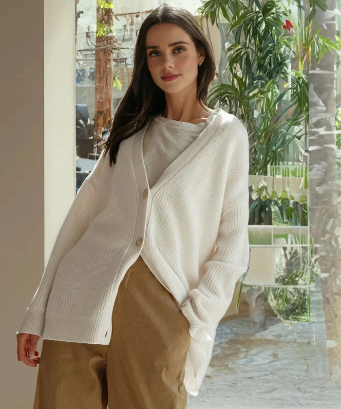 Cozy and elegant khaki knit cardigan vest for women, designed for comfortable everyday wear.